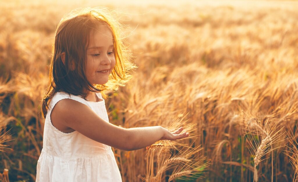 girl in wheat field find your child's dosha