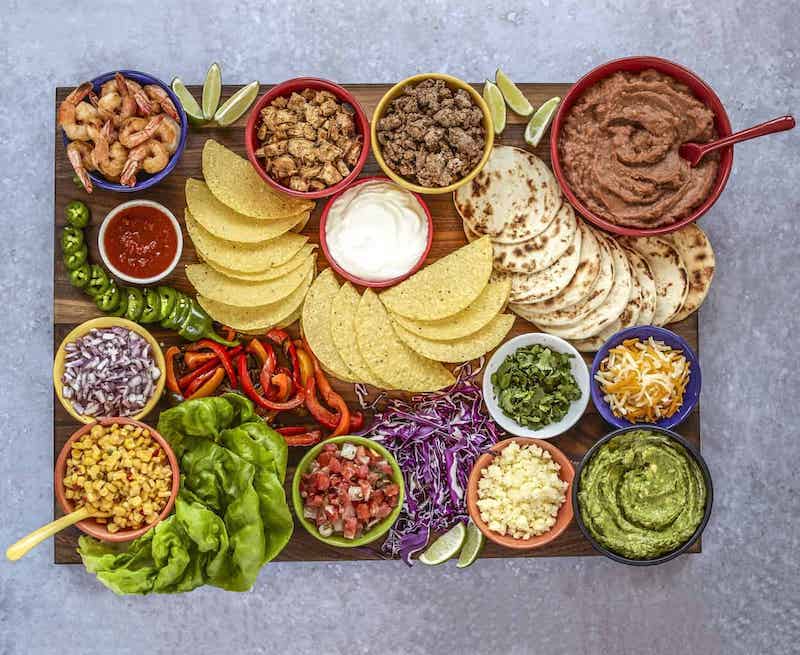 https://www.greenchildmagazine.com/wp-content/uploads/2022/06/Build-Your-Own-Taco-Board-by-The-BakerMama-scaled-2.jpeg